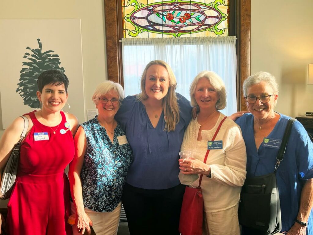 A photo of Allison with attendees at her recent fundraiser the Baker in North Little Rock